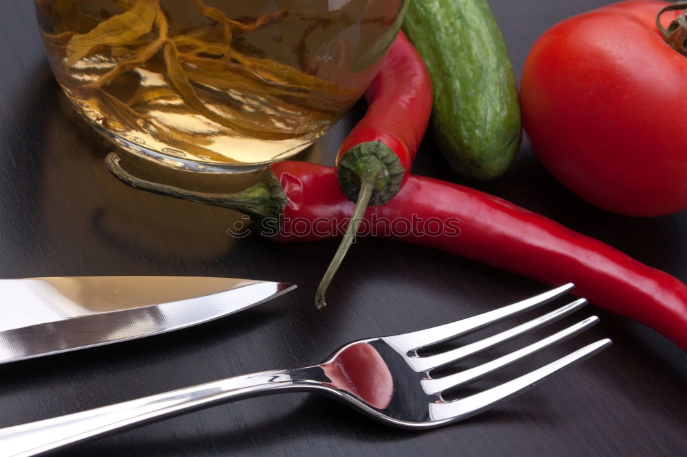 Similar – Image, Stock Photo cutting board with a knife and fresh red cherry tomatoes