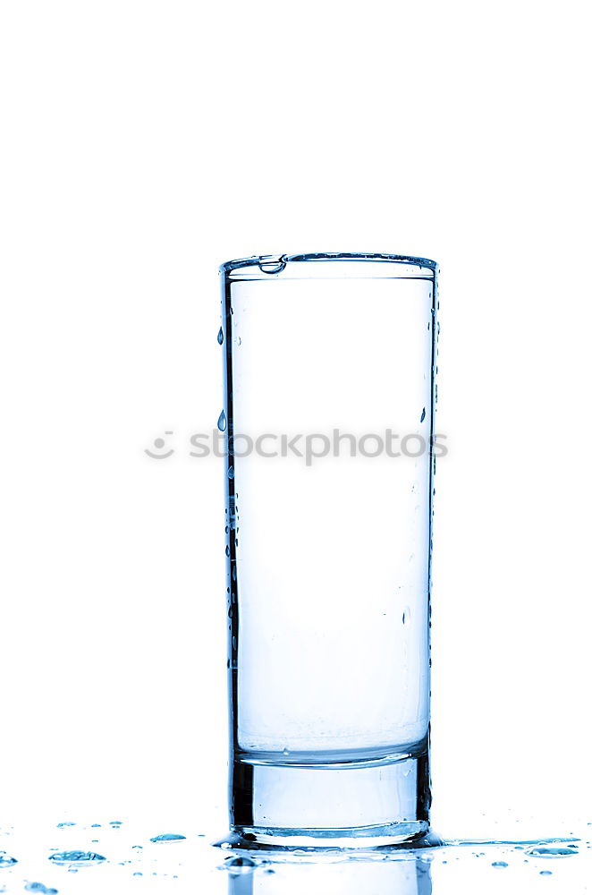 Similar – Glass filled to the brim with water in monochrome blue.