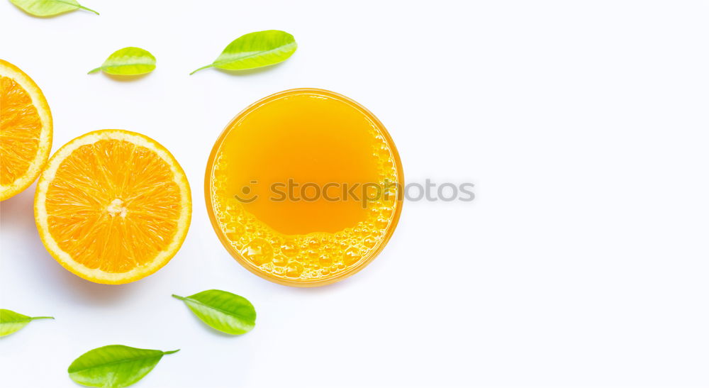 Similar – Glass of orange juice with slices of citrus fruit