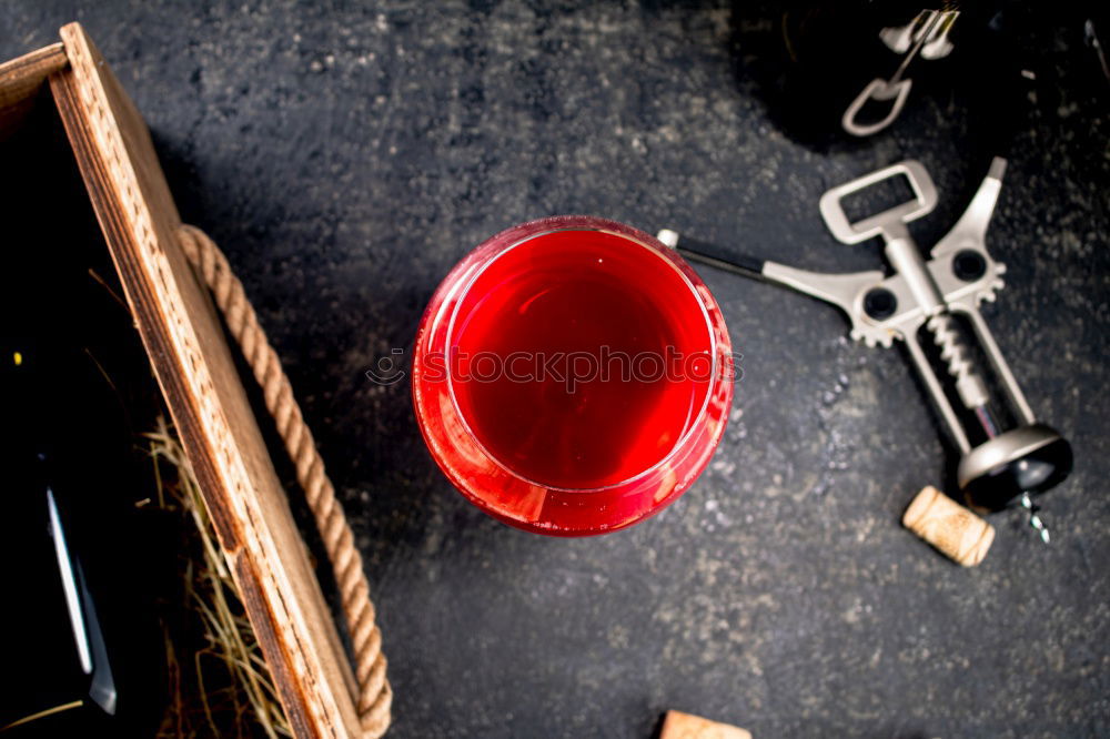 Similar – Image, Stock Photo Red wine bottle with red wine glass and grapes on black