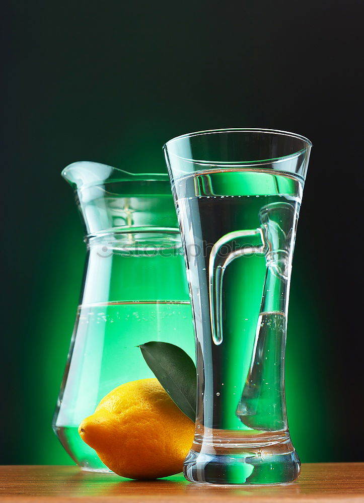 Similar – Image, Stock Photo Lime juice in bottle with fruits and juicer