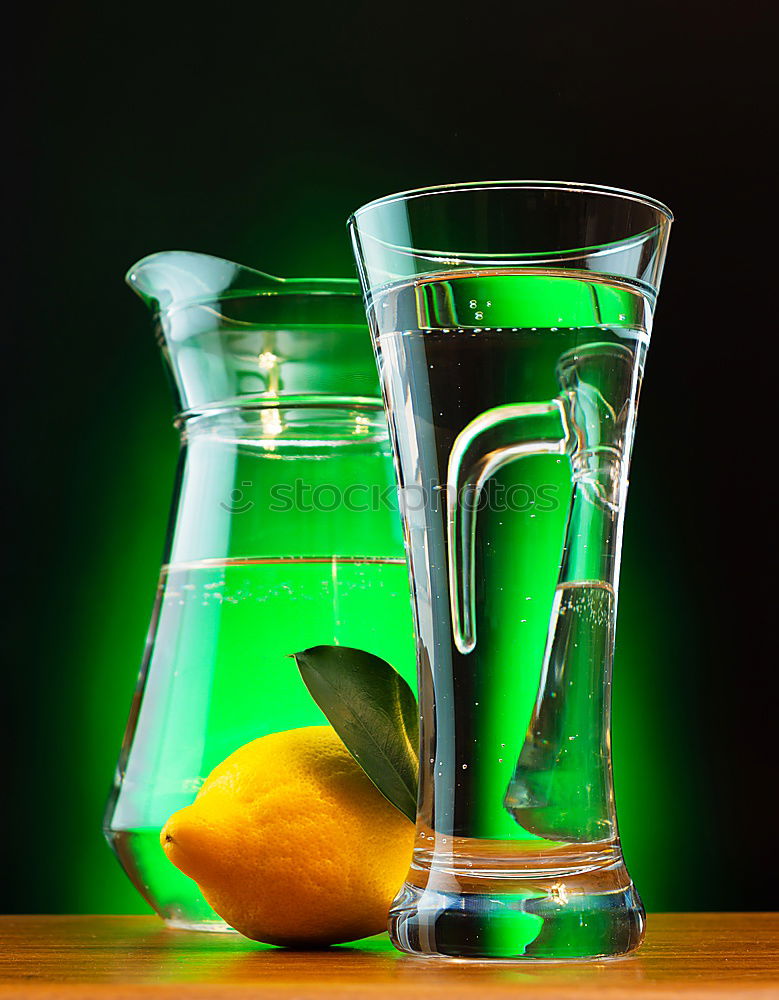 Similar – Image, Stock Photo Lime juice in bottle with fruits and juicer