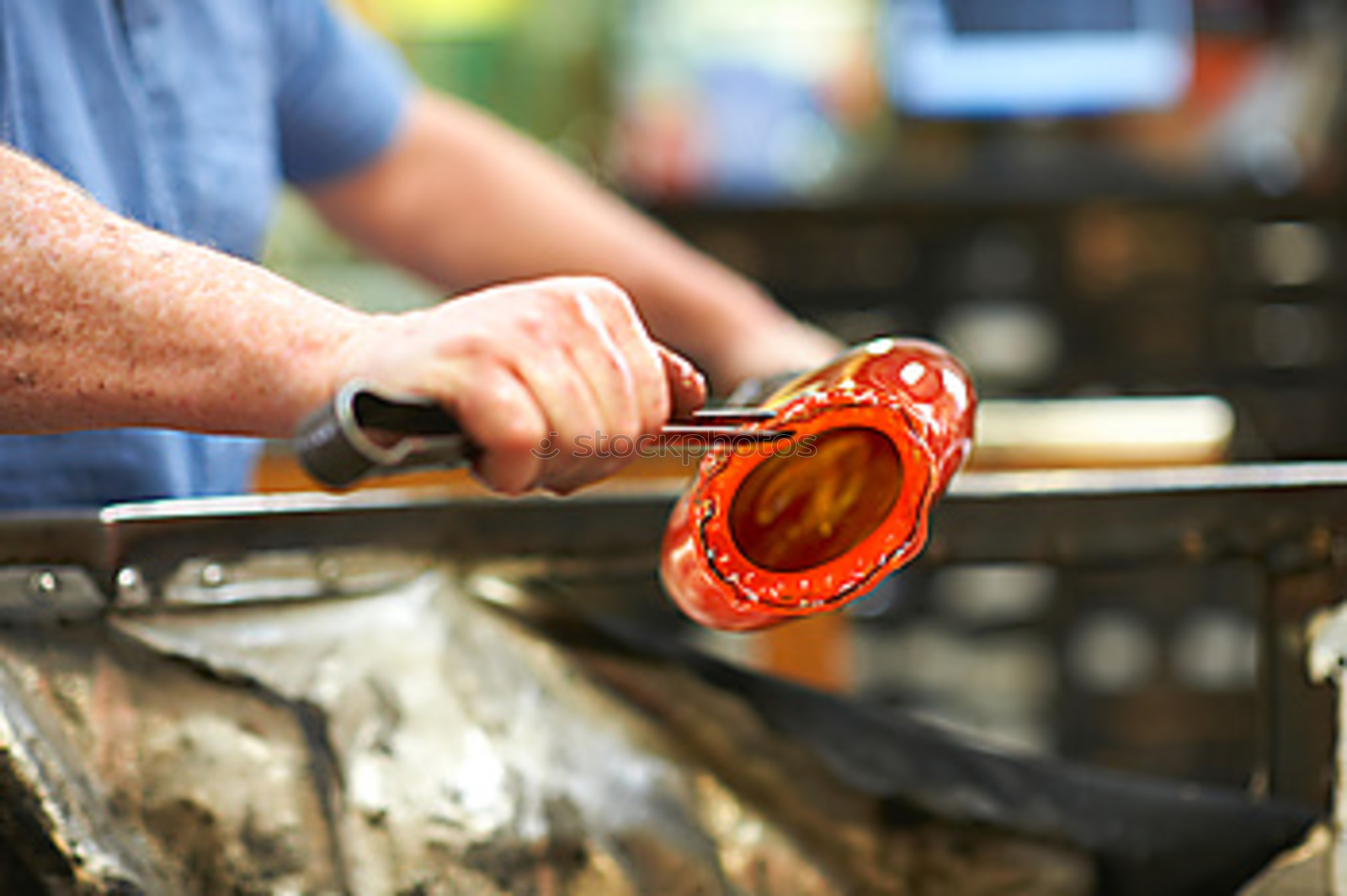 Similar – Blacksmith produces a horseshoe on an anvil with a hammer