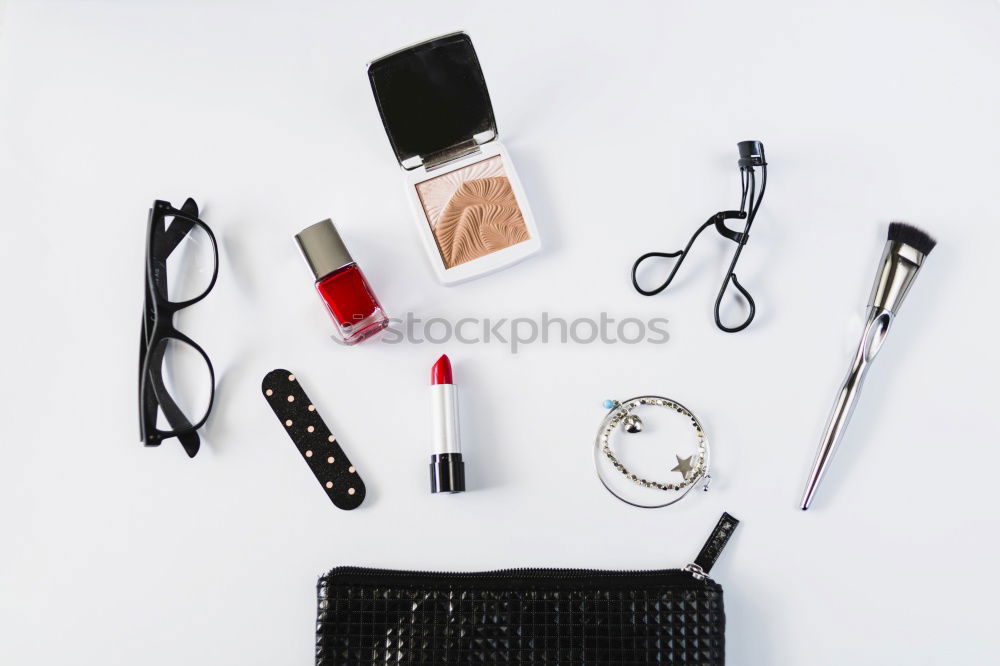 Similar – Flat lay of leather woman bag open out with cosmetics