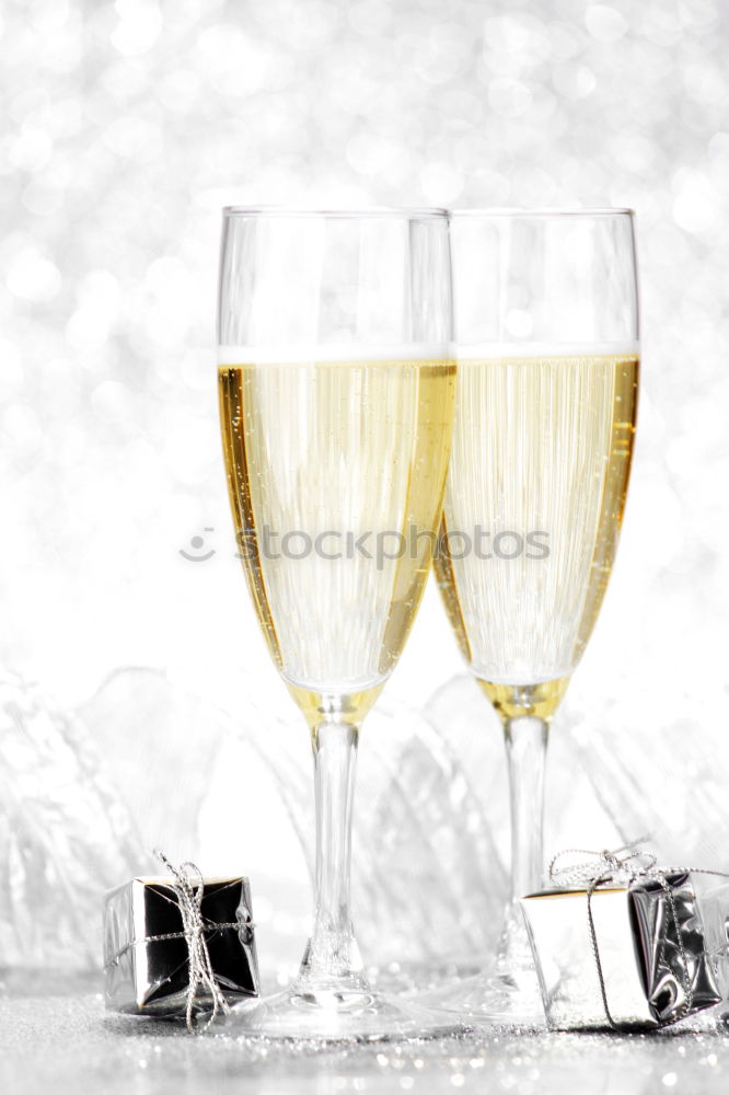 Similar – Female friends cheers clinking glasses of white wine.