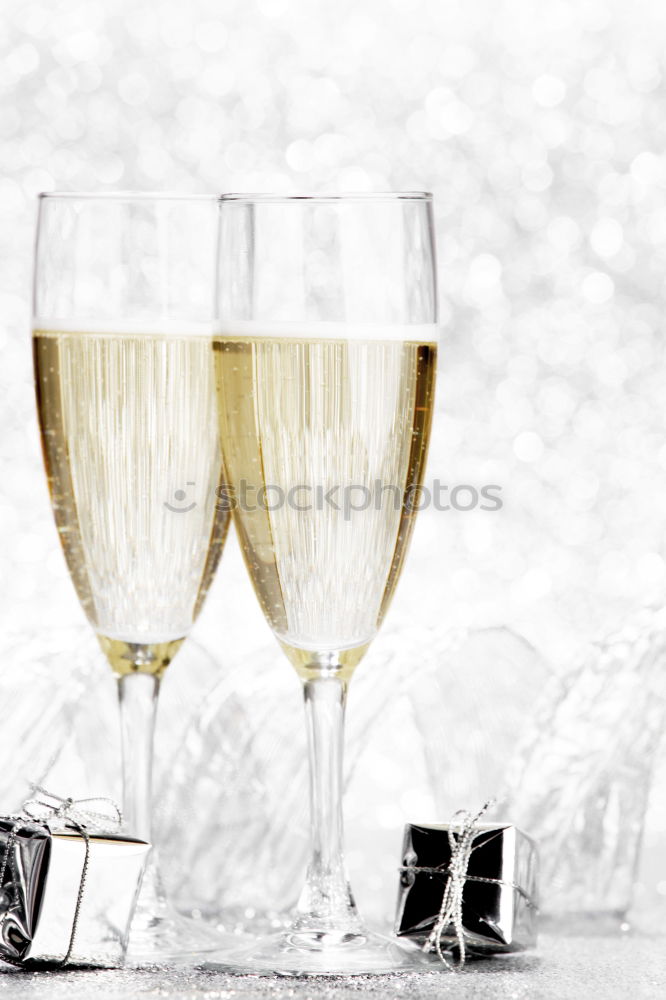 Similar – Female friends cheers clinking glasses of white wine.