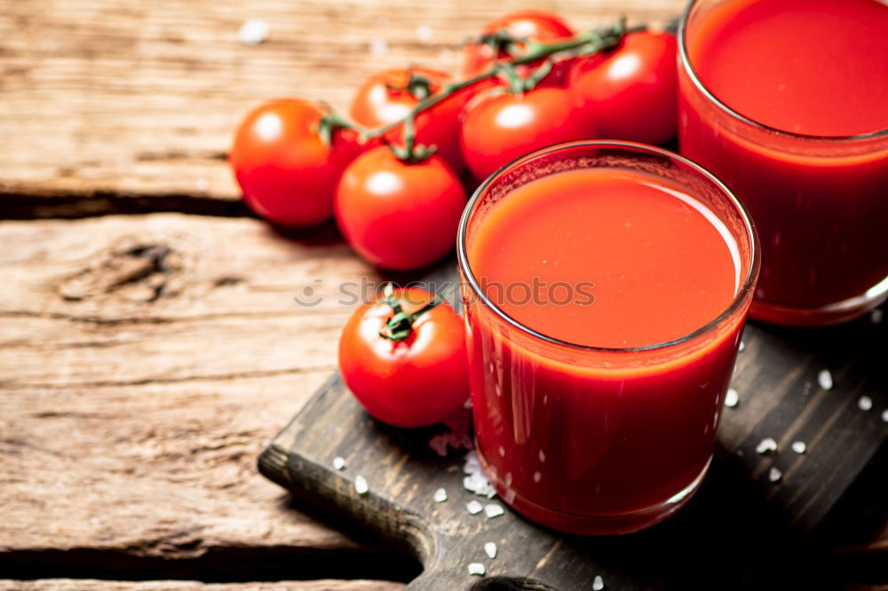 Similar – Iron mug with carrot juice in female hands