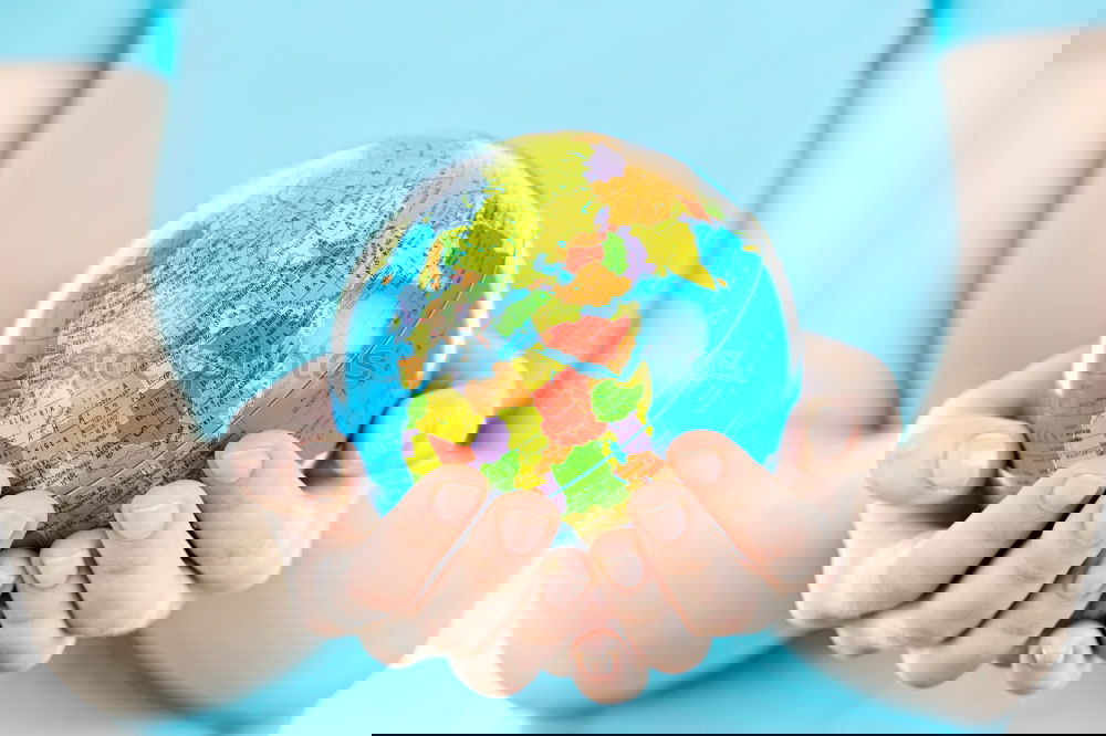 Similar – Image, Stock Photo child with a world globe in His Hands