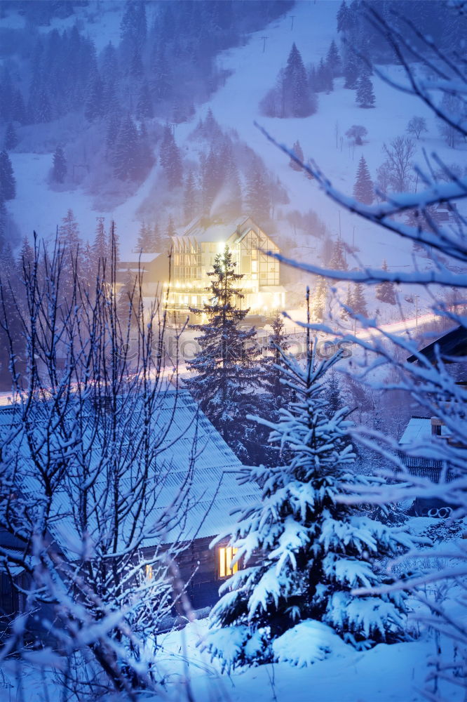 Heavily snowed road at night