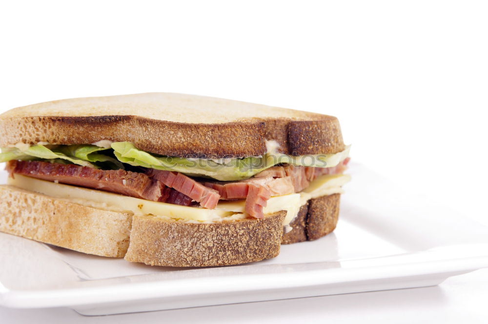 Similar – Image, Stock Photo Fresh healthy sandwich with bread, ham and vegetables.