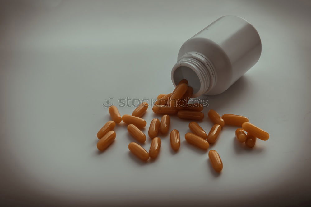 Similar – Image, Stock Photo colorful pills and medical bottle on green background