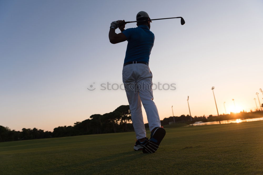 Similar – Golf: short game using a wedge iron club.