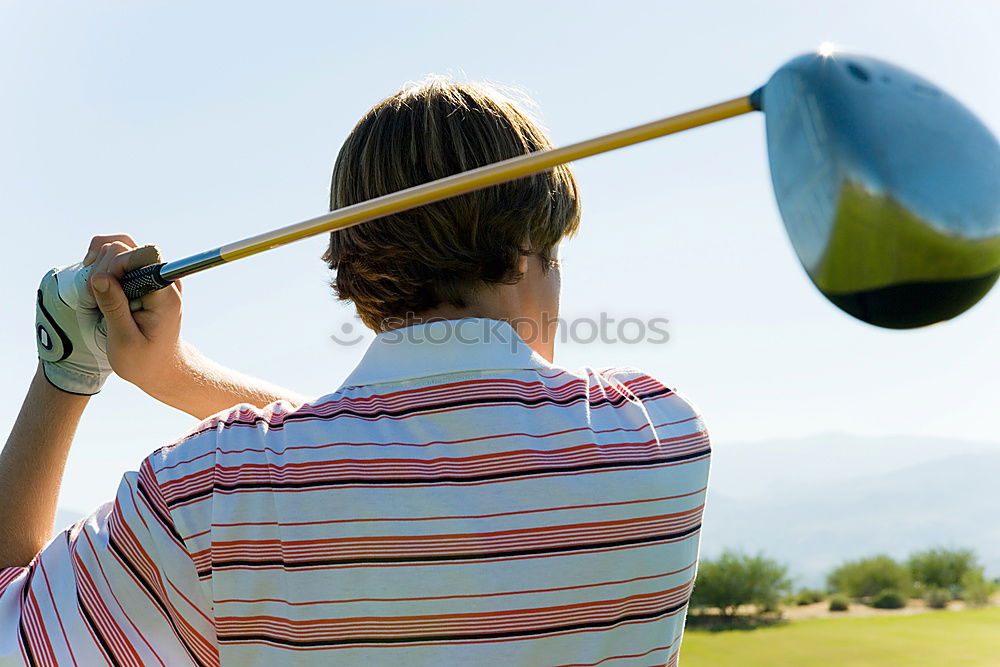 Similar – Image, Stock Photo Female golfer striking golf ball