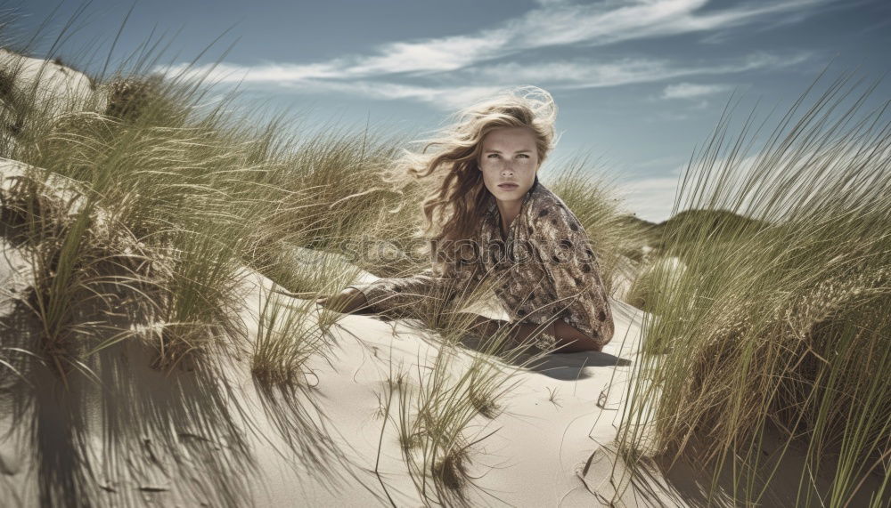 Similar – Young woman with turquoise hair sits barefoot in forest on beach and laughs loudly