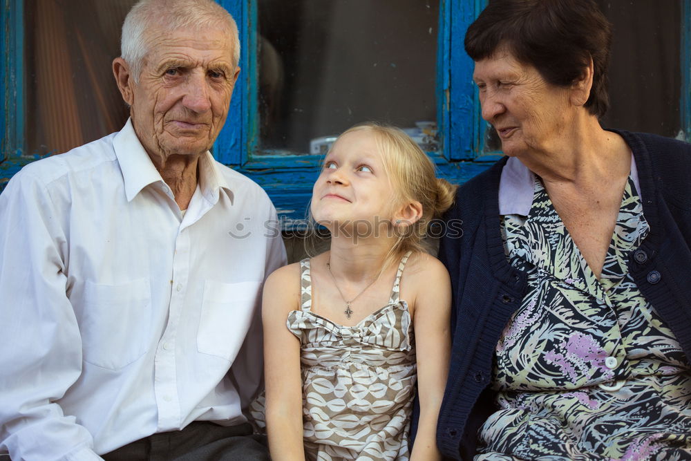 Similar – Image, Stock Photo Grandfather and grandson with a electric wheelchair