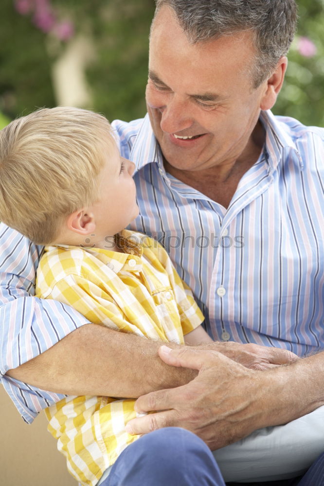 Similar – Boy kissing his grandmother