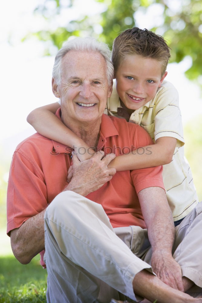 Similar – Portrait of grandfather and grandson embracing