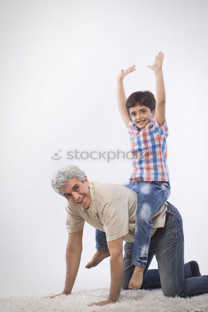 Similar – Image, Stock Photo Father and son playing on the beach