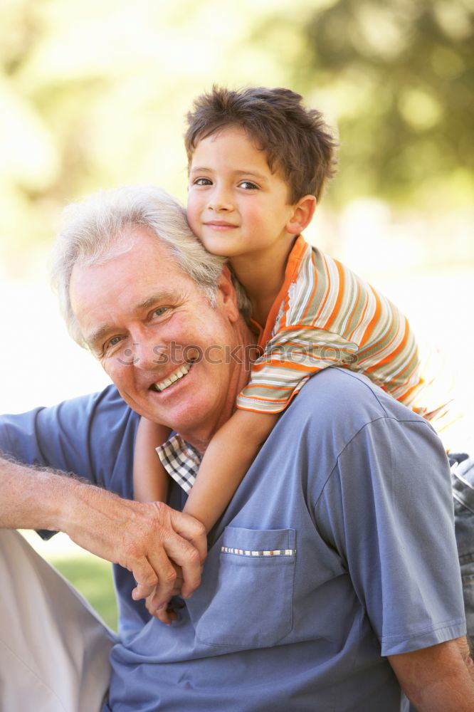 Similar – Image, Stock Photo Grandfather and grandson with a electric wheelchair