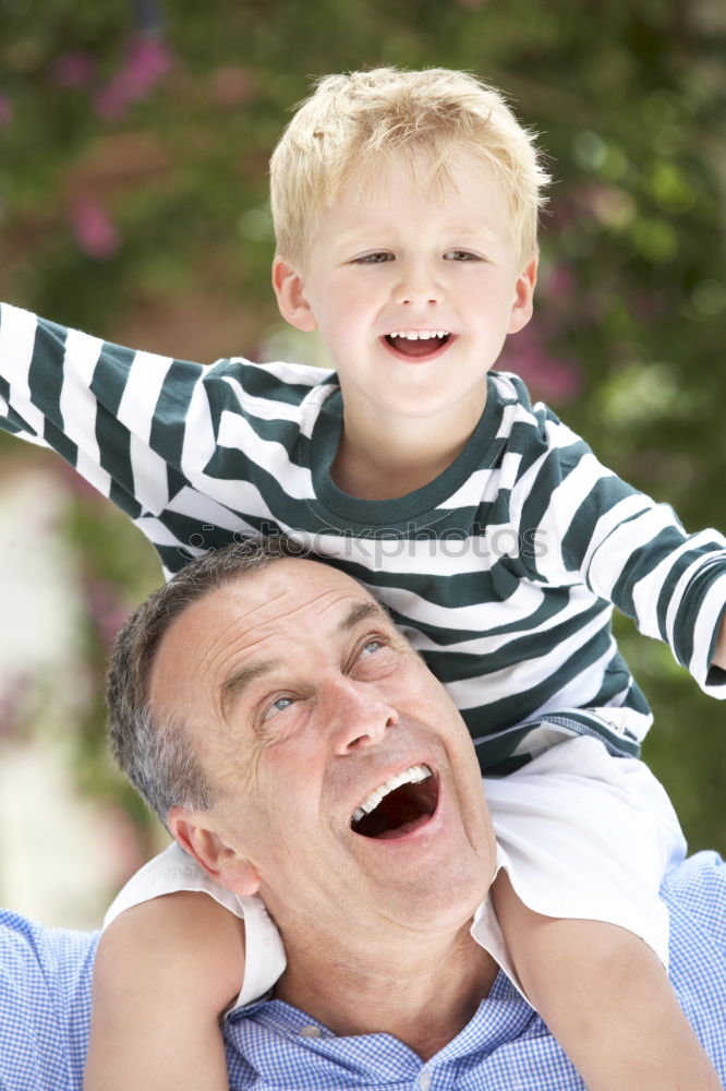 Similar – Portrait of grandfather and grandson embracing