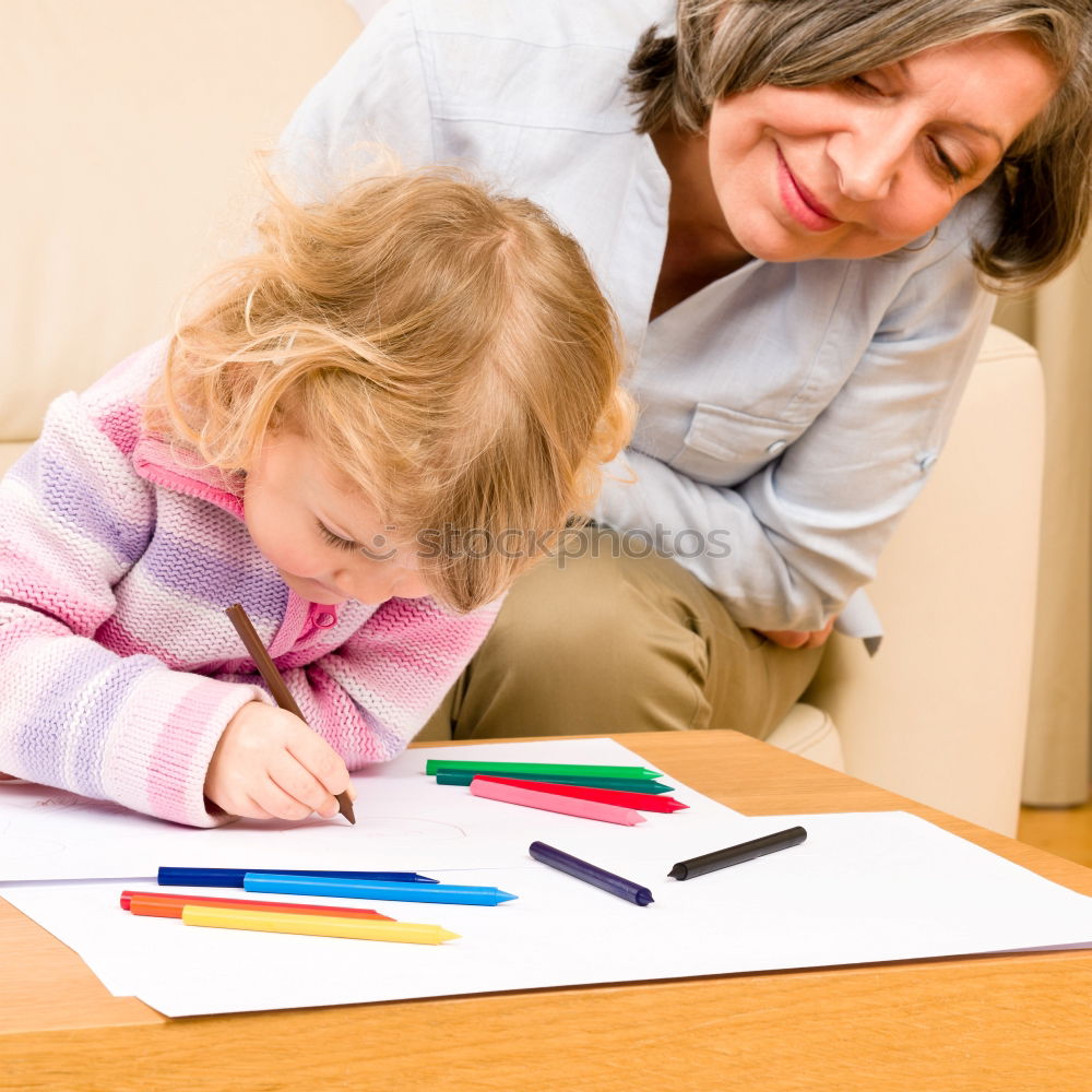 Similar – Image, Stock Photo Mom with little daughter drawing the colorful pictures