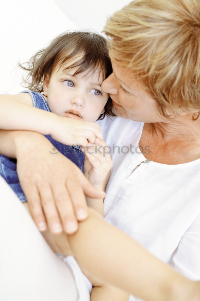 Similar – Boy kissing his grandmother