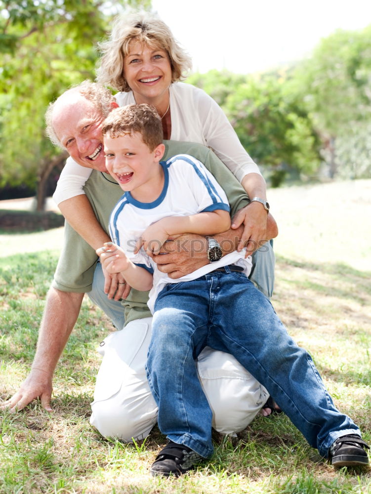 Similar – Image, Stock Photo Happy grandson hugging to his grandmother outdoors
