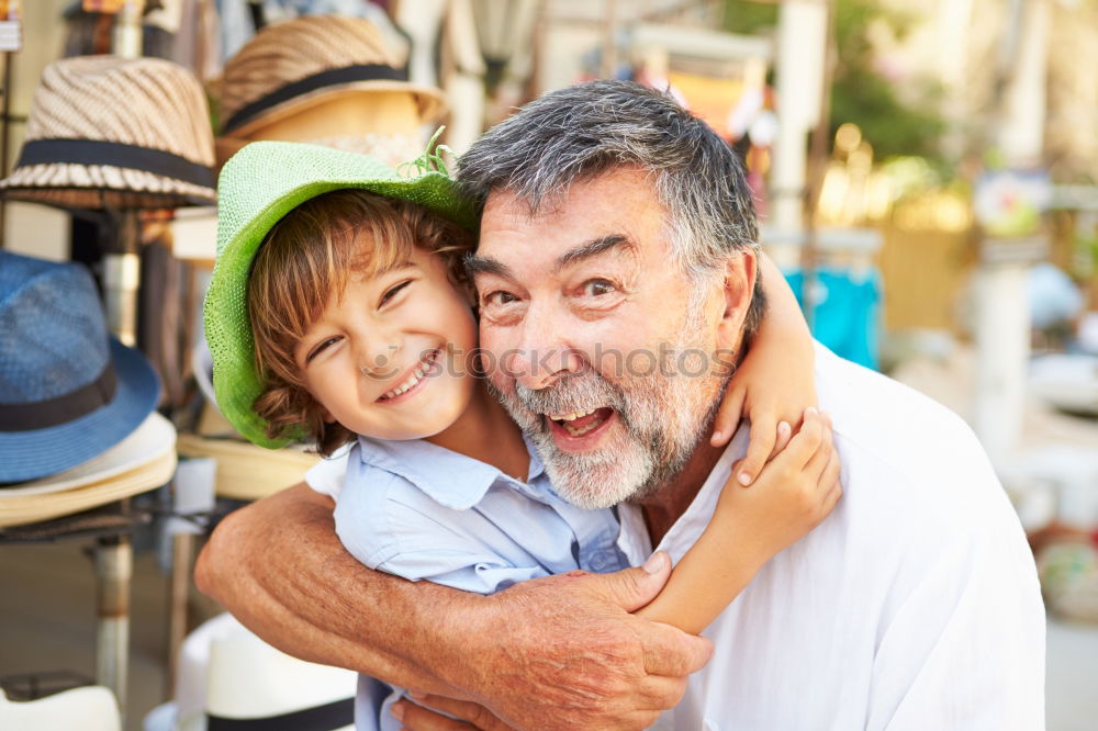 Similar – Image, Stock Photo Grandfather and grandson with a electric wheelchair