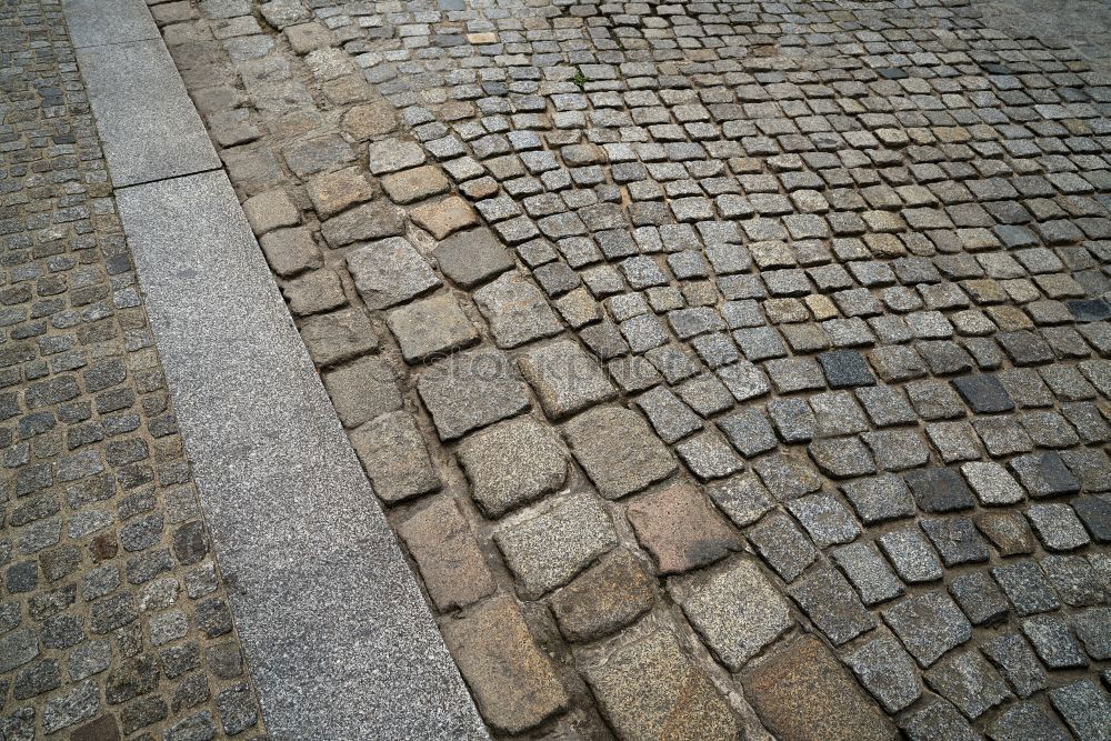 Similar – cobblestones Cobblestones