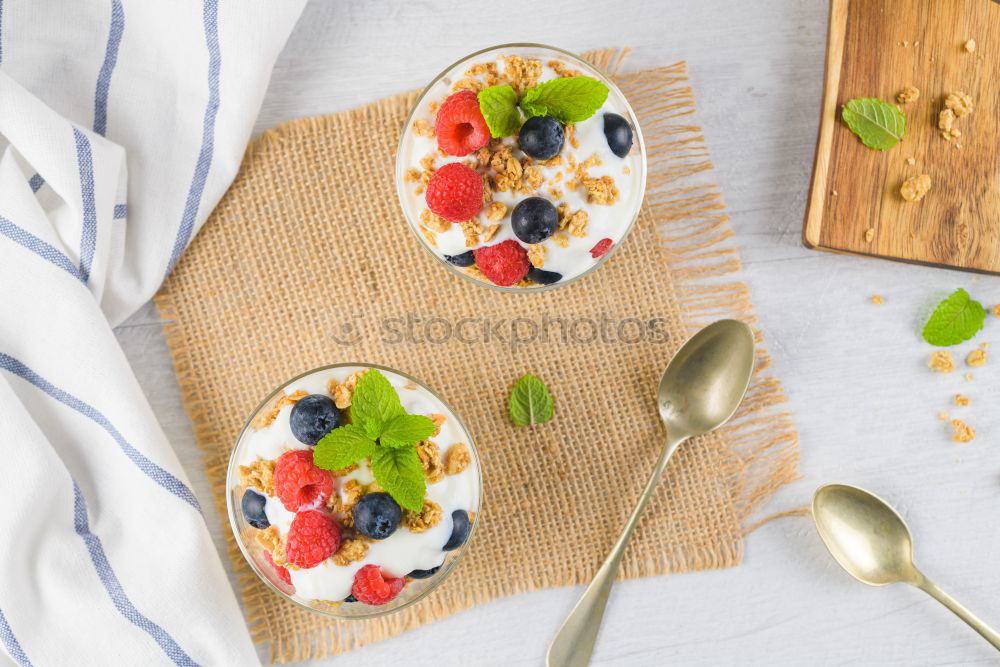 Similar – Oat flakes with milk and berries