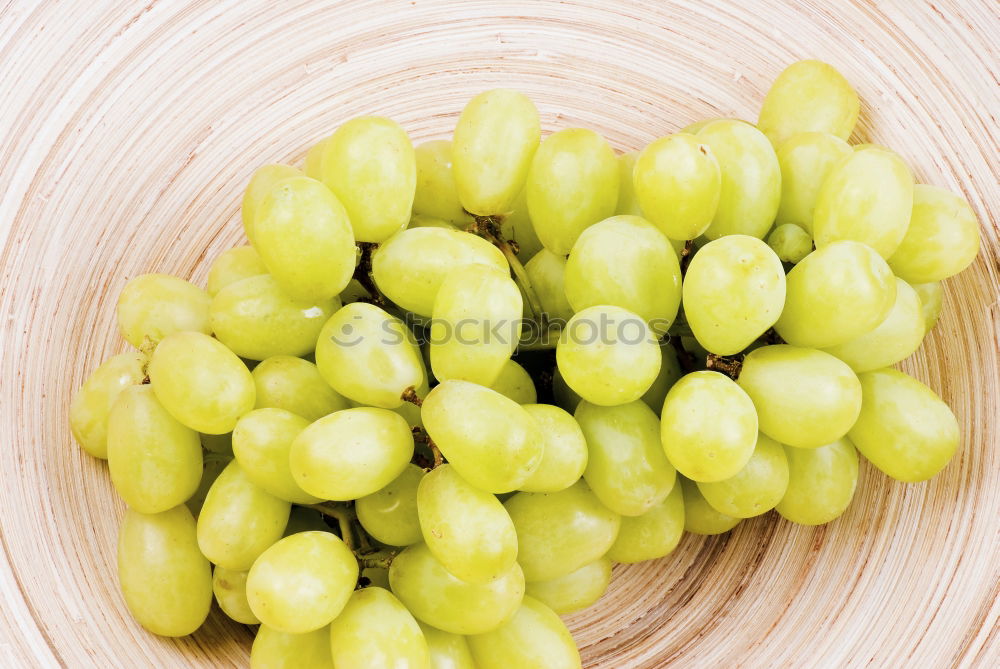 Similar – Bunch of grapes on table