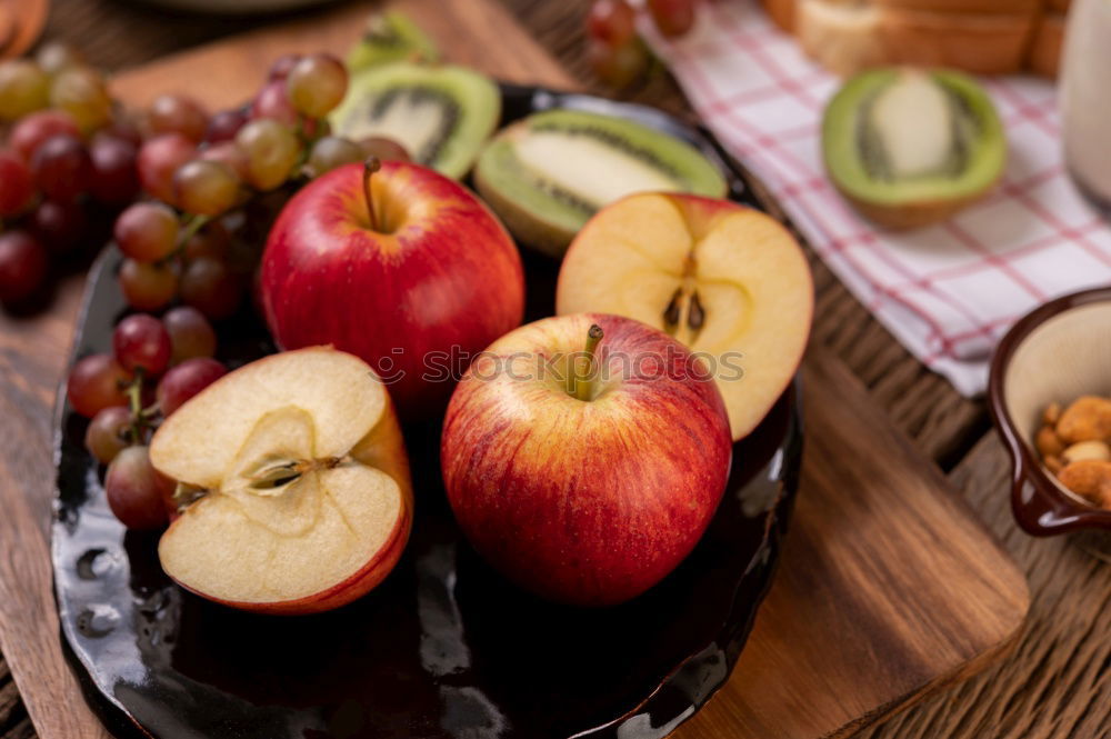 Fresh plums with leaves