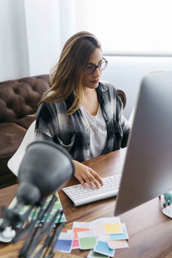 Similar – Image, Stock Photo afrcian woman on her cellphone while looking at laptop