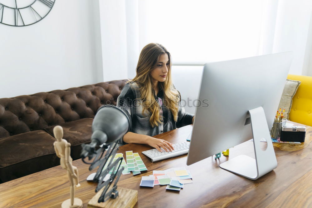 Similar – Young beautiful blonde woman on the computer working