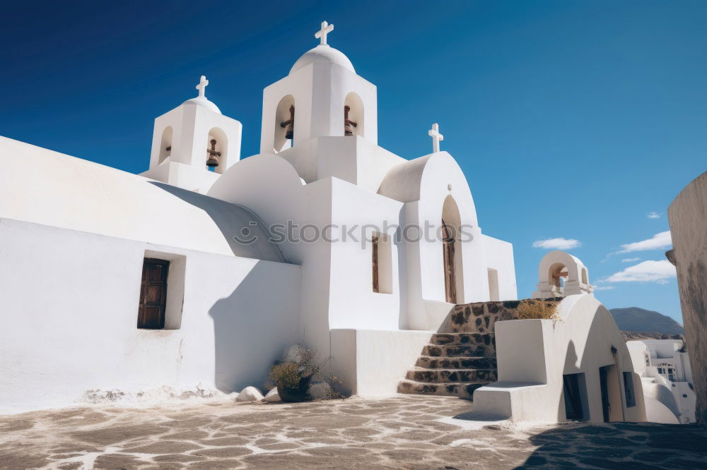 Similar – Image, Stock Photo Idyllic white houses on Santorini with windmills in front of blue sky