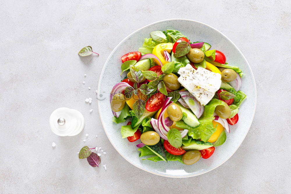 Similar – Mixed salad with baby leaves, radish, cucumber and feta cheese