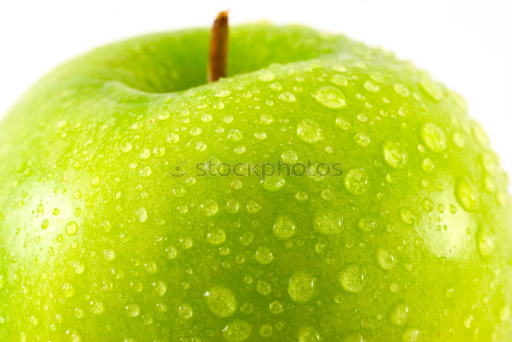 Similar – Apple slice on a green area