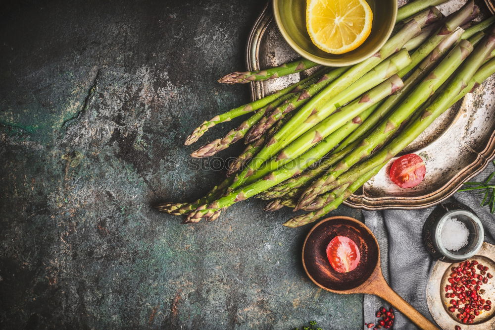 Similar – Image, Stock Photo Asparagus with wooden spoon and cooking ingredients