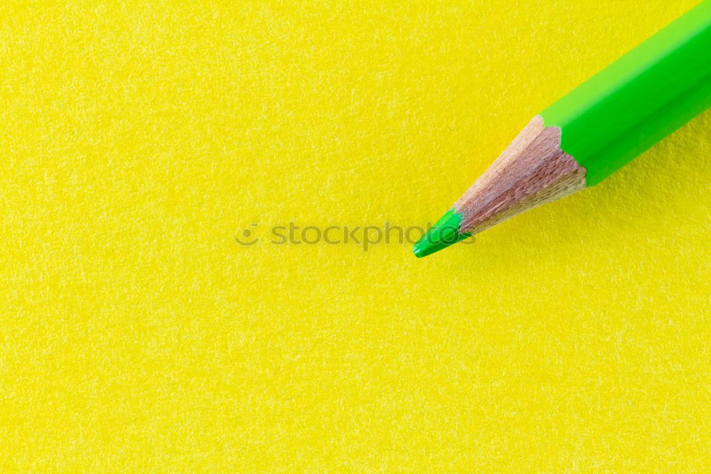 Similar – Image, Stock Photo Forearm and hand with pencil against a yellow background