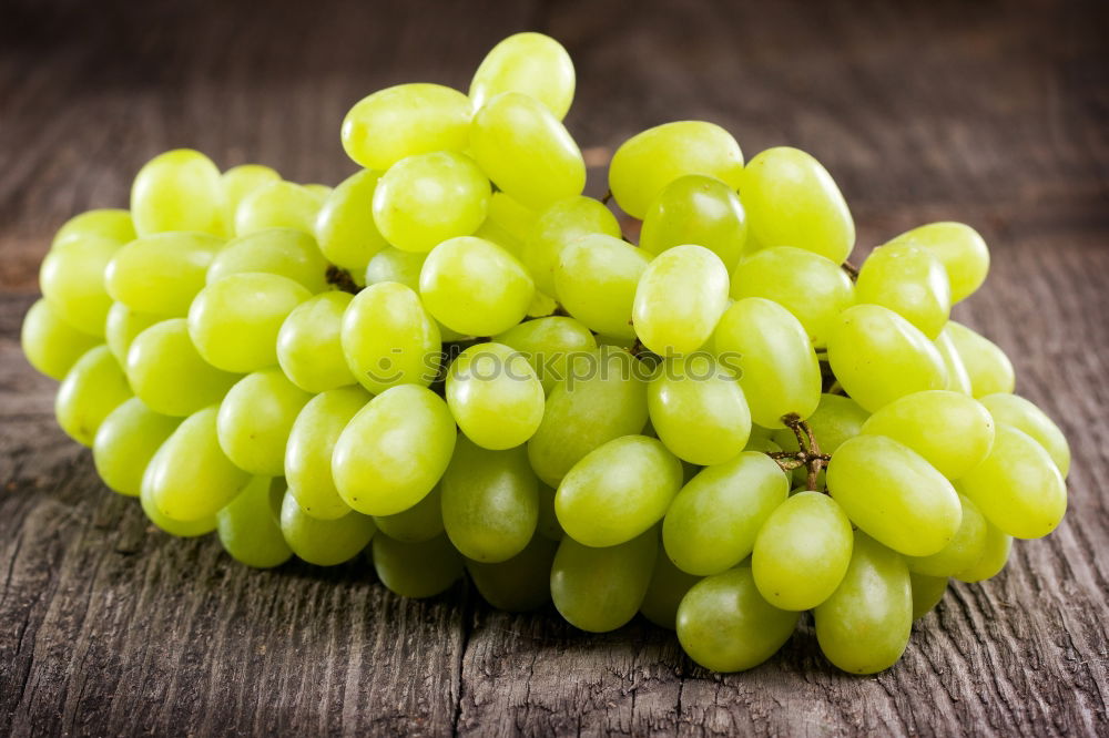 Similar – Bunch of grapes on table