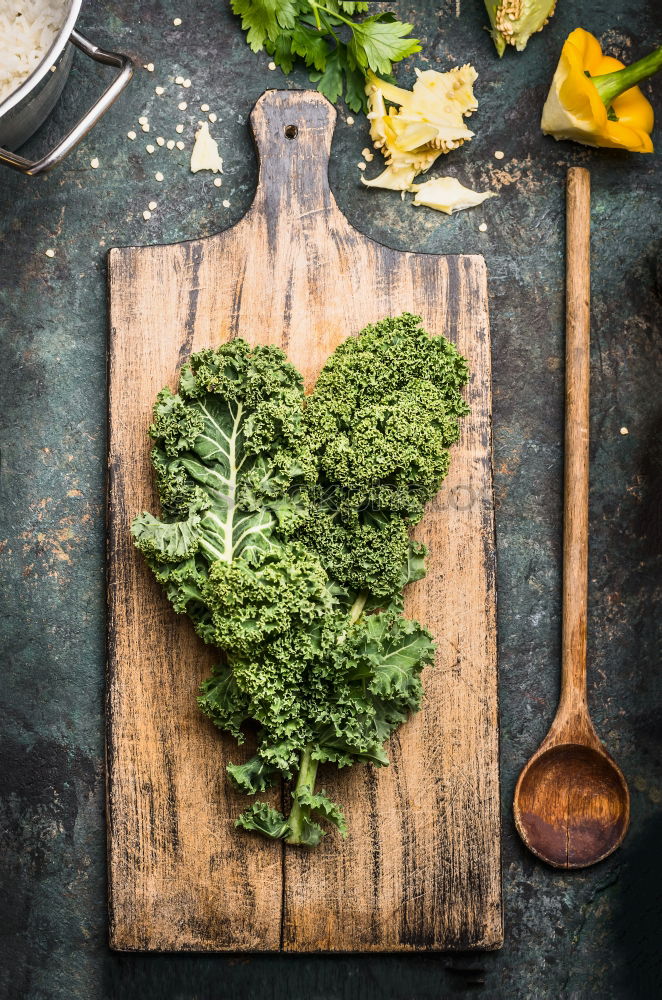 Similar – Green kale pesto in glass on dark rustic kitchen table background with ingredients, top view. Kale preparation. Healthy detox vegetables . Clean eating and dieting concept.