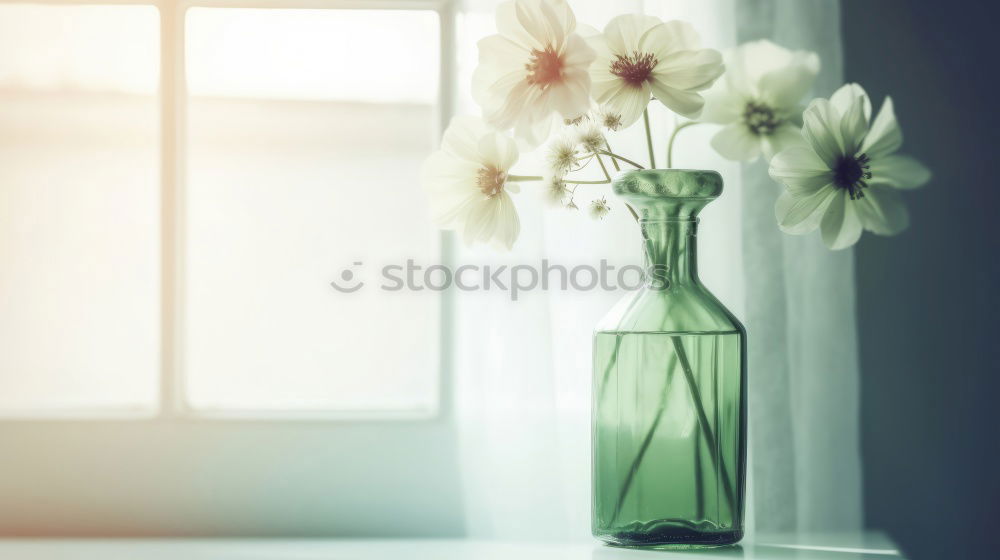 Similar – Flowers in a vase on the table