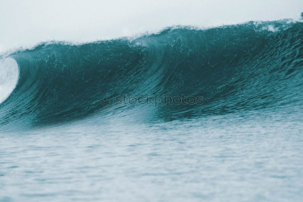 Similar – Surfer in wave Ocean Waves