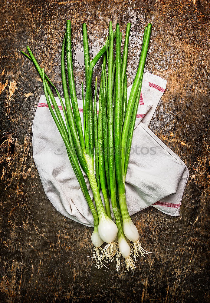 Image, Stock Photo Spring onion on a rustic wooden table