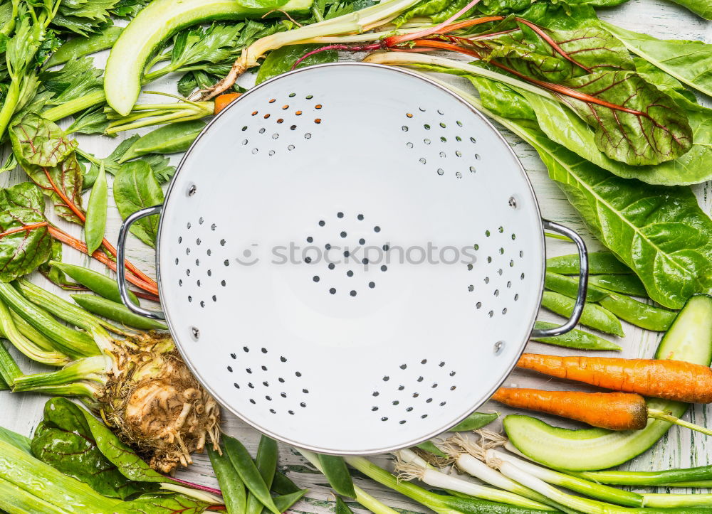 Image, Stock Photo Green organic vegetables around empty kitchen sieve