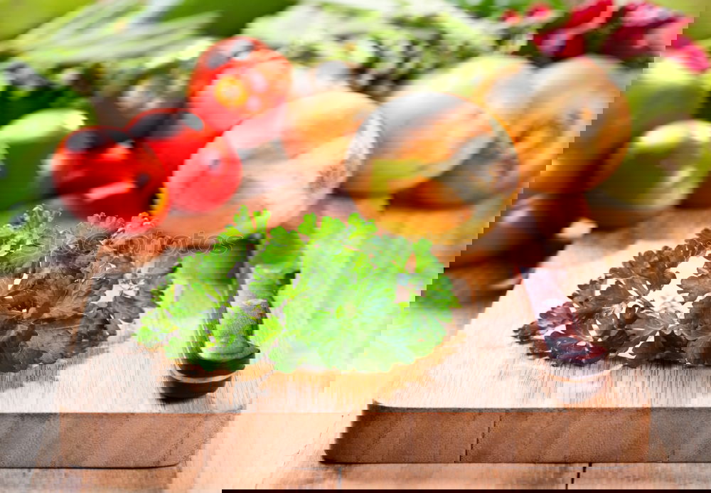 Similar – Image, Stock Photo Tomato and cucumber salad on a kitchen board