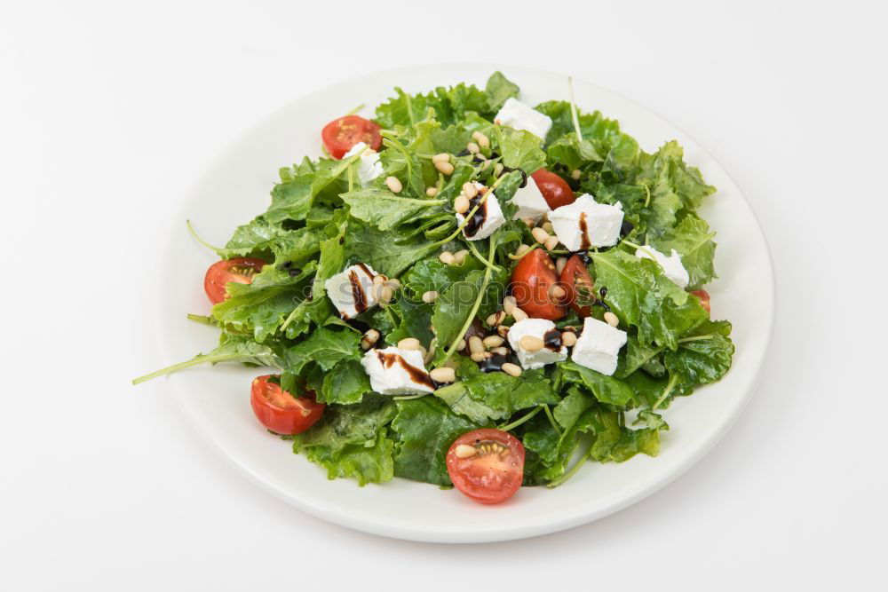 Similar – Mixed salad with baby leaves, radish, cucumber and feta cheese