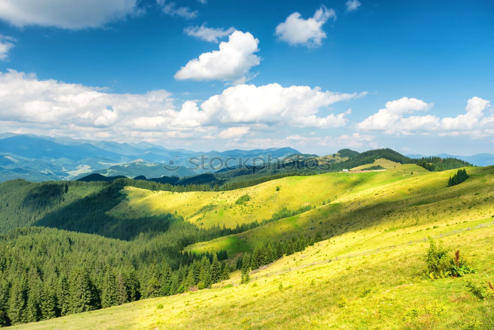 Similar – Image, Stock Photo Green sunny valley in mountains and hills