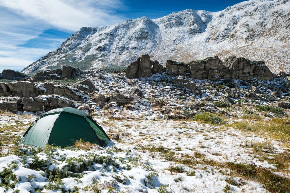 Similar – Image, Stock Photo Green tent on the green lawn in snow mountains