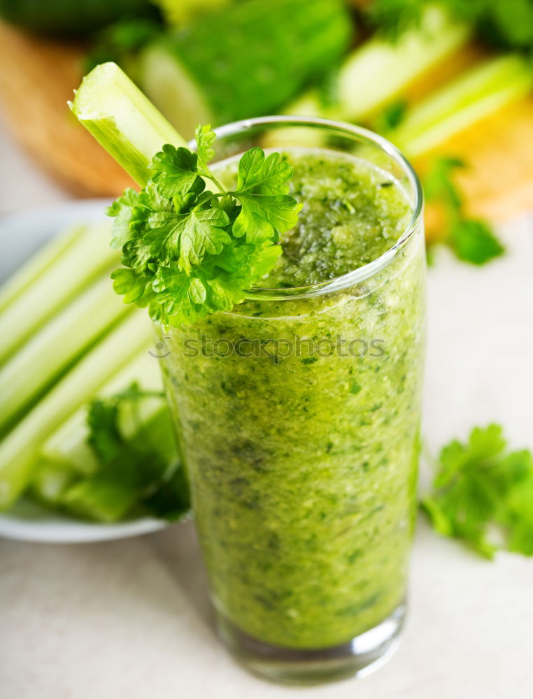 Smoothie with green vegetables in a jar